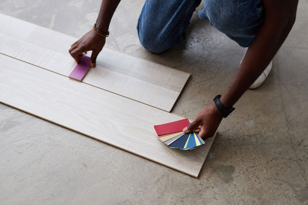 a person holding a color swatch